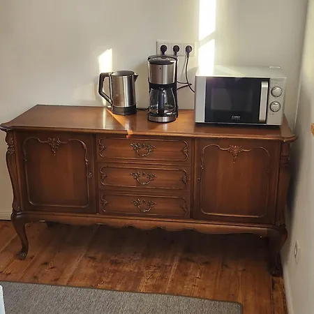 Апартаменты Fachwerkzeit Haus Mit Zwei Кведлинбург